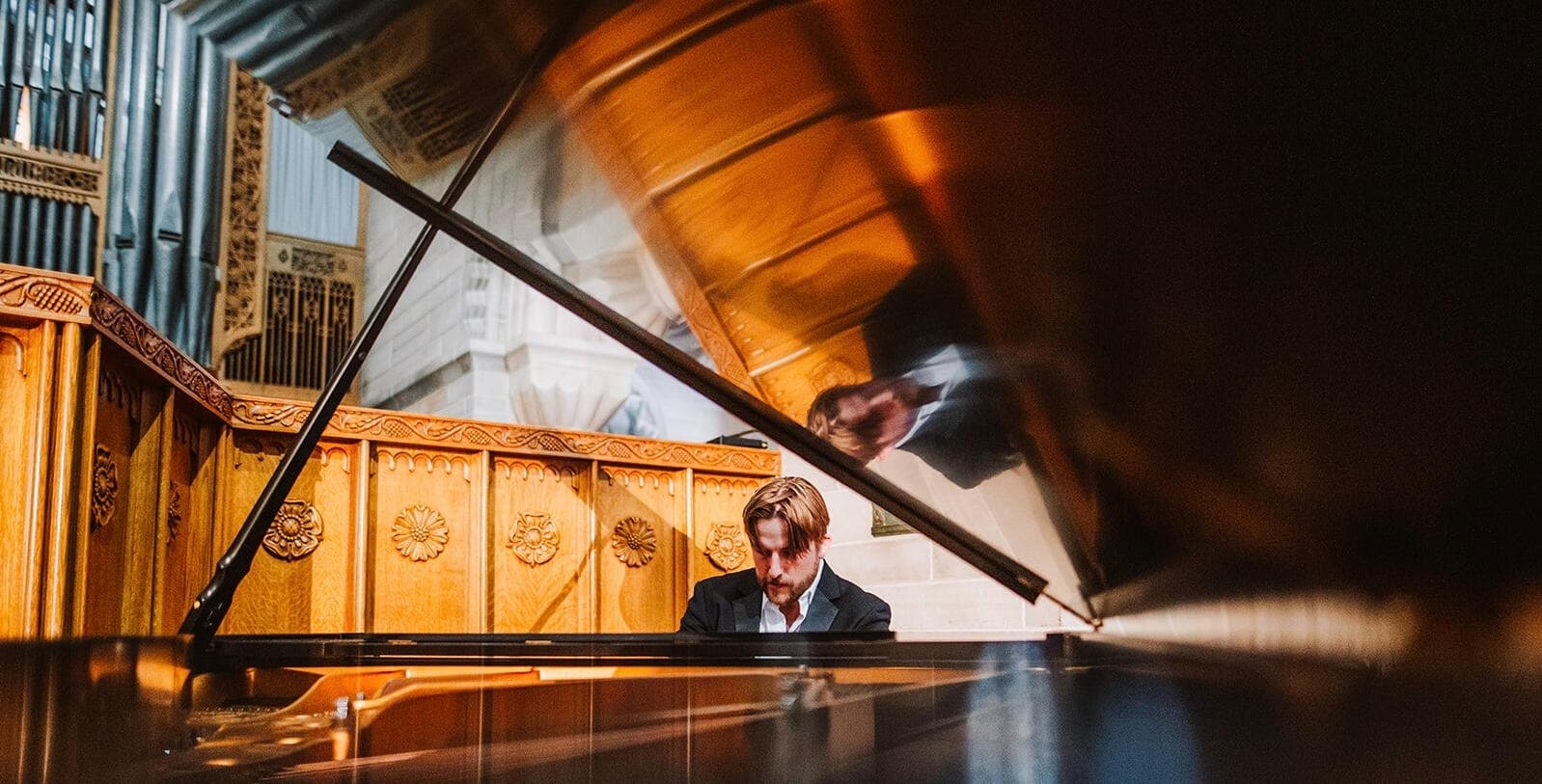 Matt Shill performing at a piano